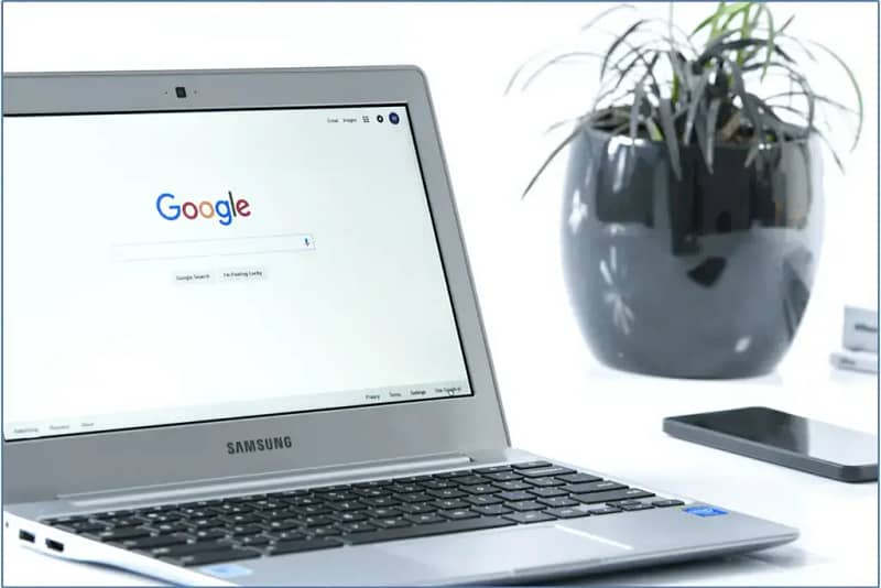 Image of a laptop with Google search pulled up to represent where PPC ads are shown